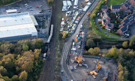 Drone shots reveal 800-tonne crane set to lift derailed cement wagons