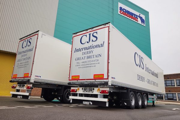 TWO NEW UK-BUILT SCHMITZ CARGOBULL TRAILERS FLY INTO AVIATION EXPERTS CJS INTERNATIONAL